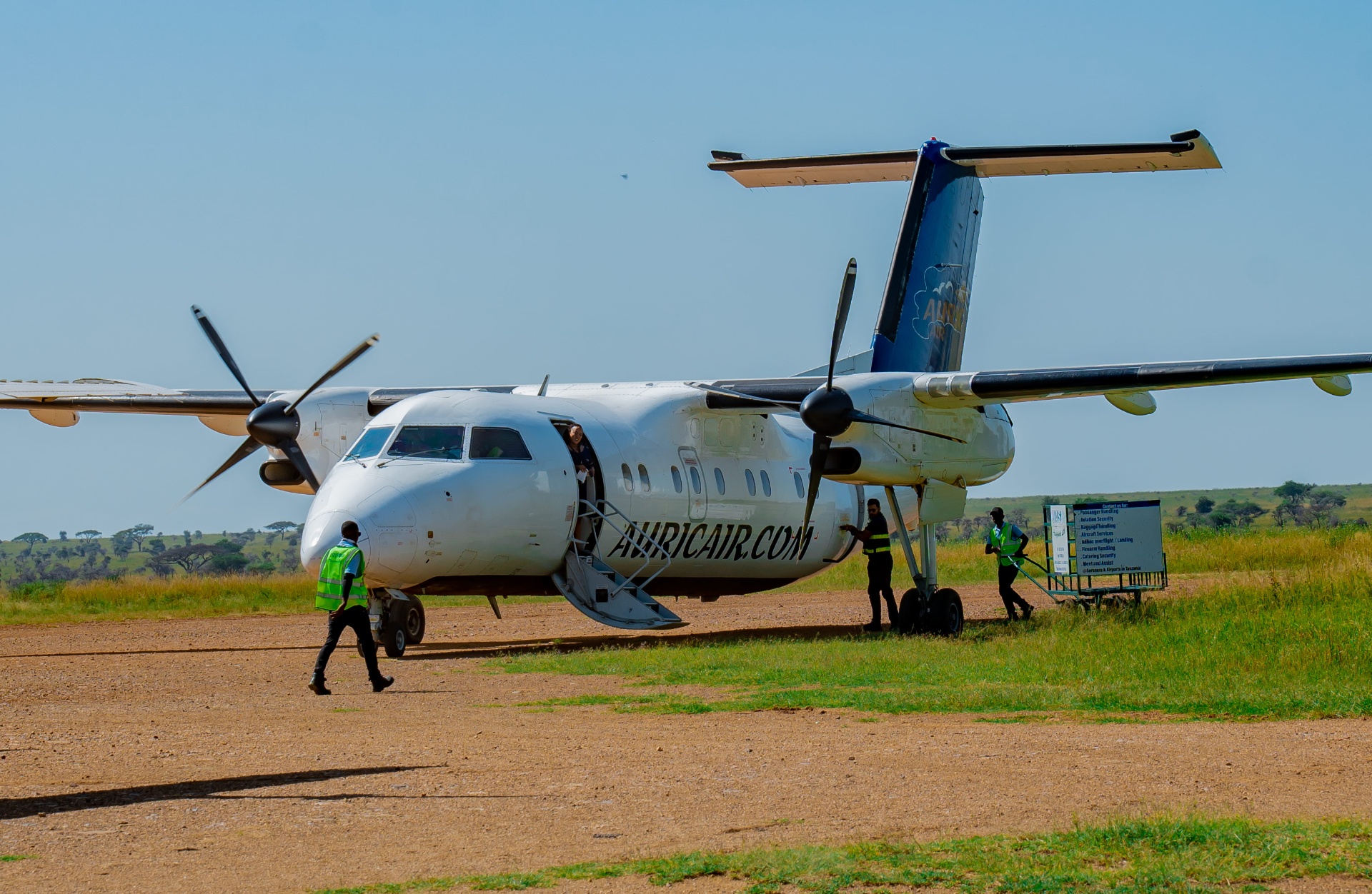 Bush flight arrival on a Serengeti airstrip