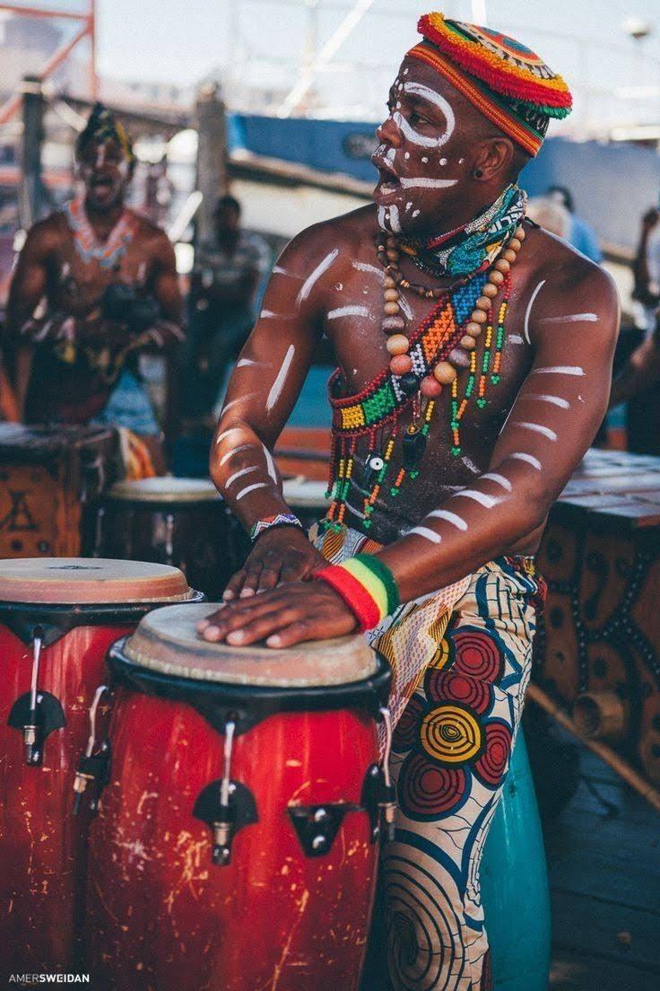 Painted drummer performing at Sauti za Busara festival